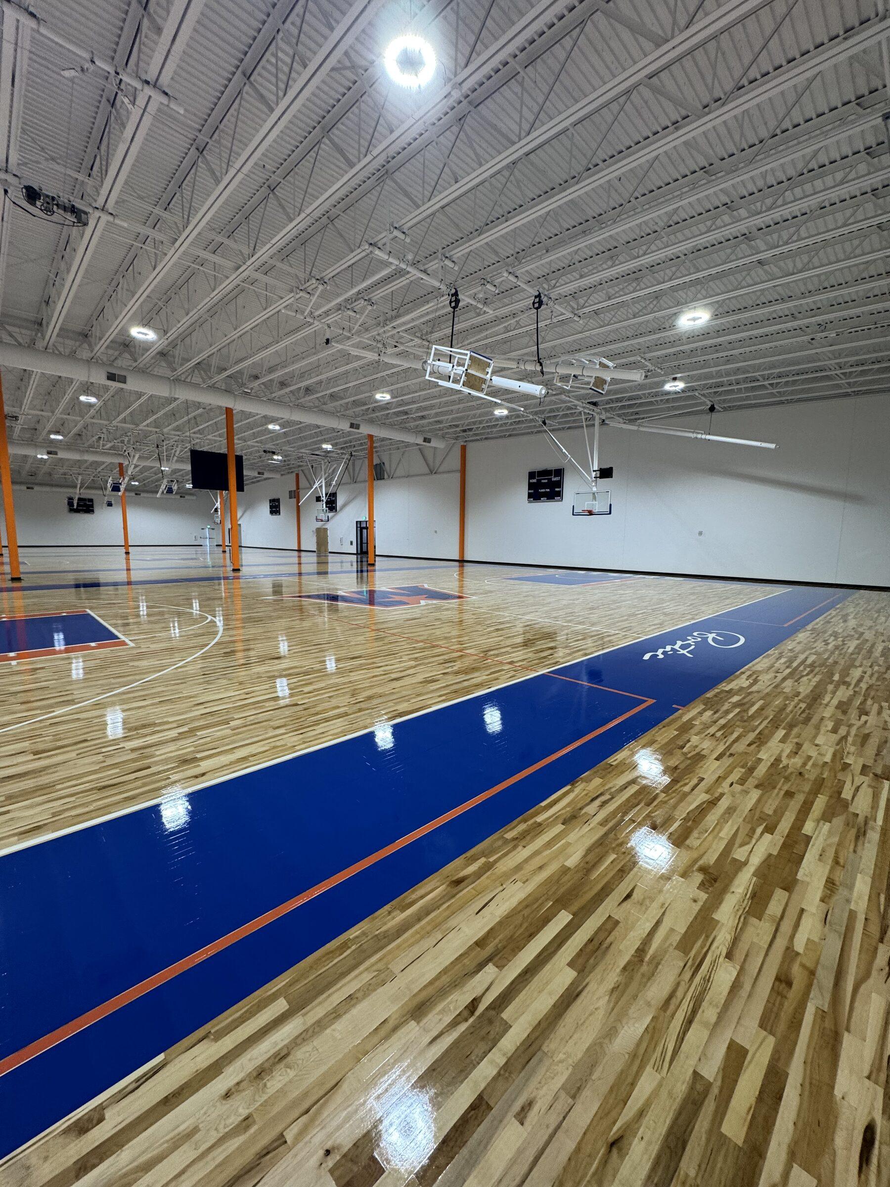 Gleaming basketball court at a sports academy we maintain